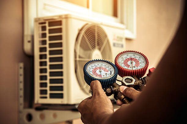 Professional Heat Pump Repair technician working in Camden, TN